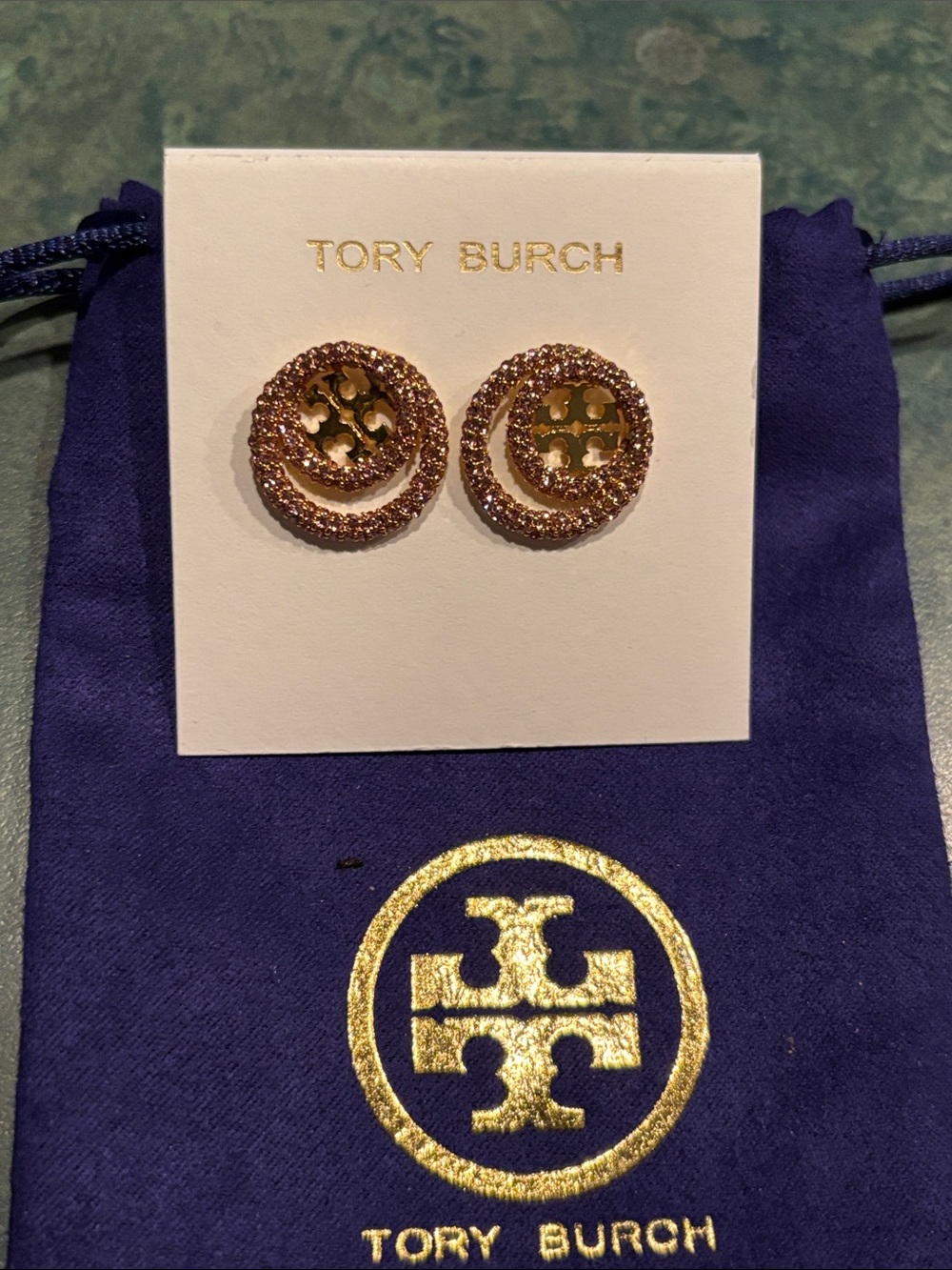 Brand new Tory Burch gold plated with pink stone stud earrings